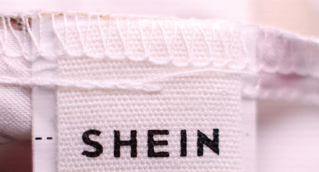  A Shein logo is pictured on the label on a childs top in Manchester, Britain, December 11, 2024. REUTERS/Phil Noble/File Photo