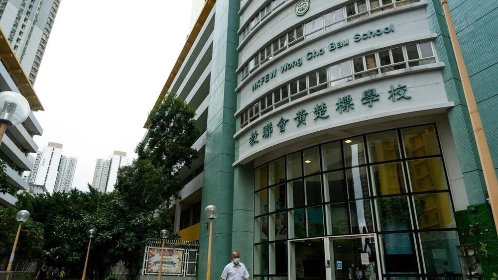A Hong Kong school has asked parents to volunteer their children to spend a week in quarantine so they can greet visiting dignitaries. (AFP) A Hong Kong school has asked parents to volunteer their children to spend a week in quarantine so they can greet visiting dignitaries. (AFP)