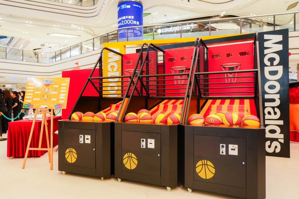 The McDonald's Hong Kong DSE Student Party features immersive workplace experience game booths, a themed photo installation, and a basketball challenge, all showcasing McDonald's vibrant and joyful workplace culture.