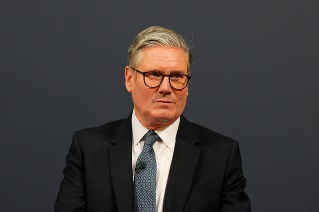 Britain's Prime Minister Keir Starmer looks on during a press conference at the UK-EU summit at Lancaster House on May 19, 2025 in London, England. Carl Court/Pool via REUTERS