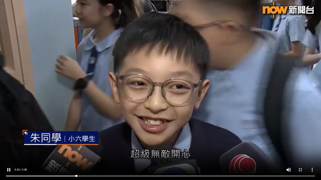 Chu could hardly hide his excitement as he spoke to reporters after being allocated to Wah Yan College, Kowloon. (Scrrengrab from Now News)