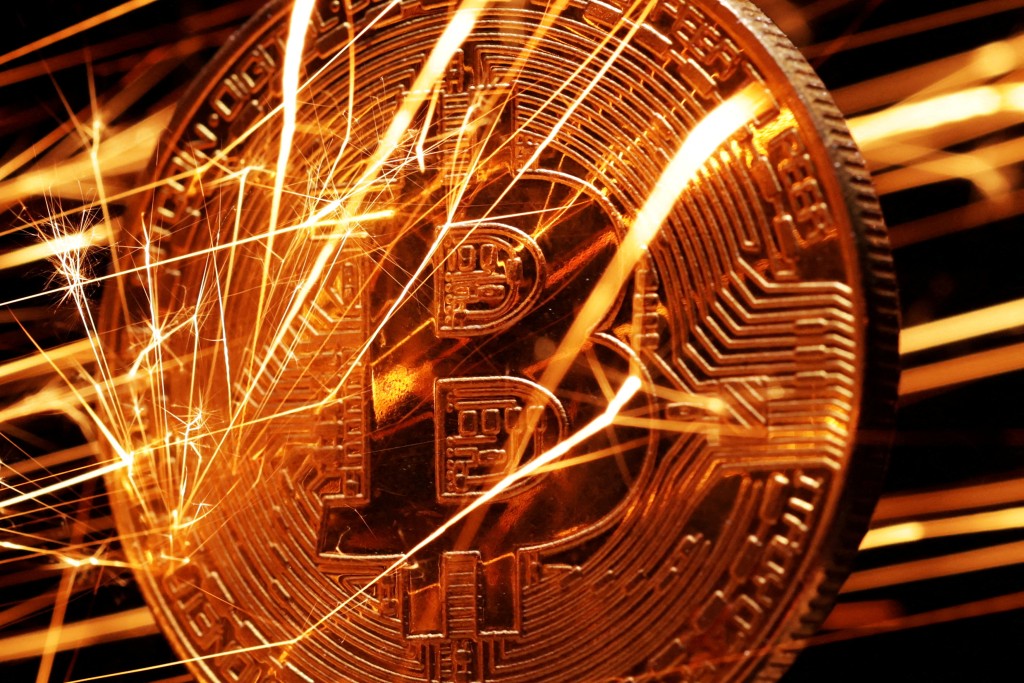 Sparks strike representation of cryptocurrency Bitcoin in this illustration created on November 24, 2024. REUTERS/Dado Ruvic/Illustration