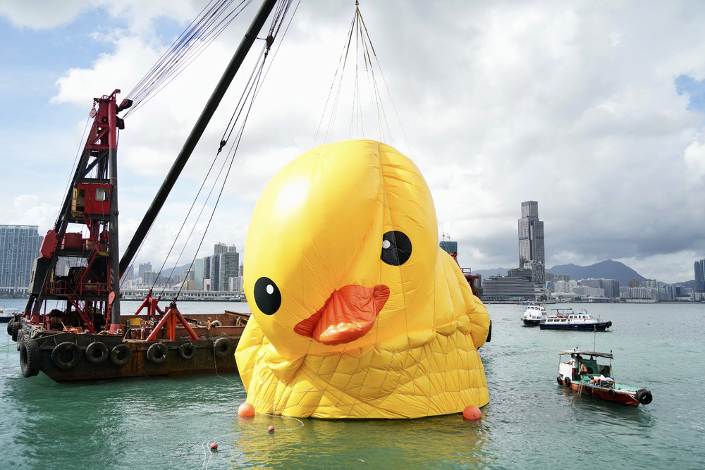 A deflated duck departs Hong Kong for repairs. A deflated duck departs Hong Kong for repairs.