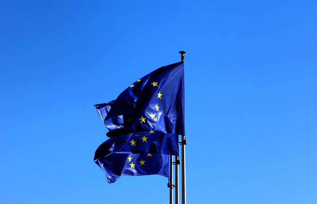 European Union flags flutter outside the EU Commission headquarters in Brussels, Belgium March 18, 2025. REUTERS