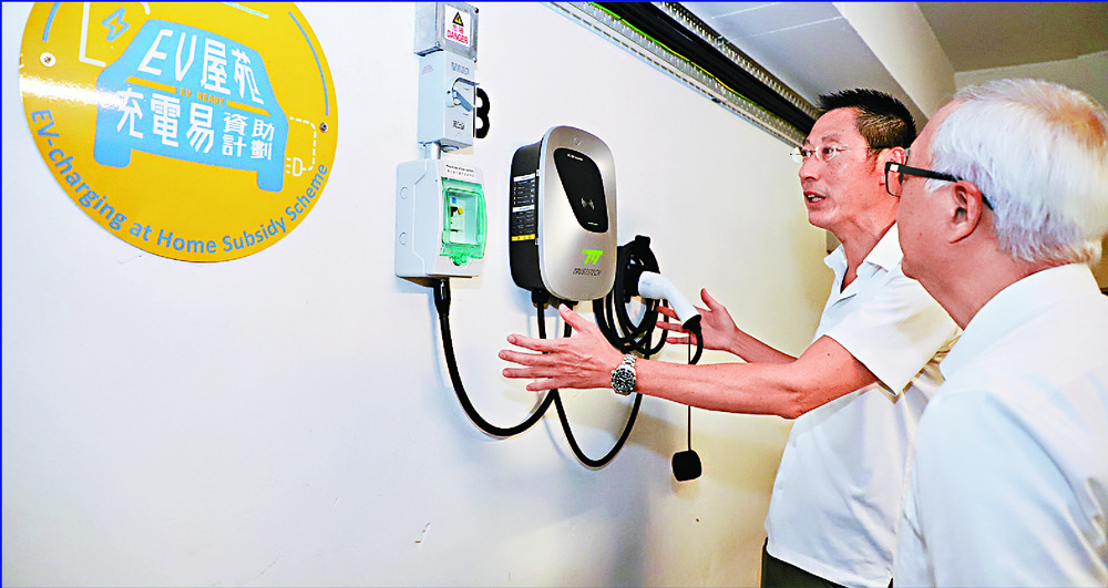 Tse Chin-wan, far right, says the scheme has been praised as 'second to none.' Tse Chin-wan, far right, says the scheme has been praised as 'second to none.'