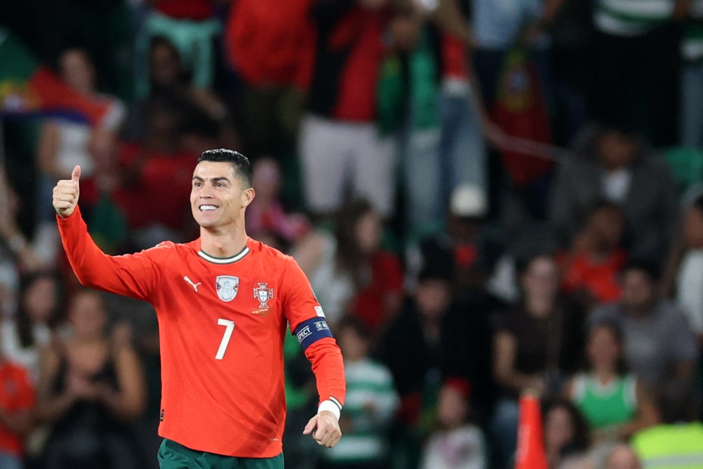 Cristiano Ronaldo celebrates after scoring the equalising goal during the 2026 World Cup qualifiers Europe zone group F football match between Portugal and Hungary at Jose Alvalade stadium in Lisbon on October 14, 2025. (AFP)
