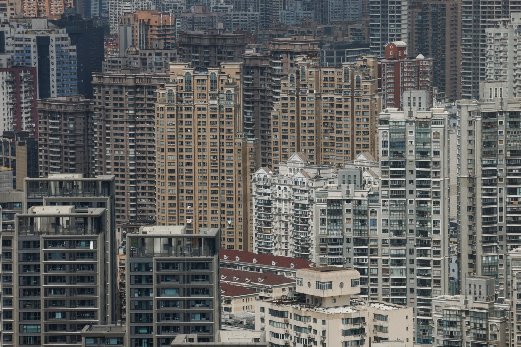 Residential buildings are pictured in Shanghai, China September 29, 2024. REUTERS/Tingshu Wang