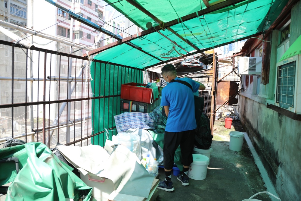 Rooftop huts are a housing of last resort for Hong Kong residents like Hing Lam Leung. (Bloomberg) 