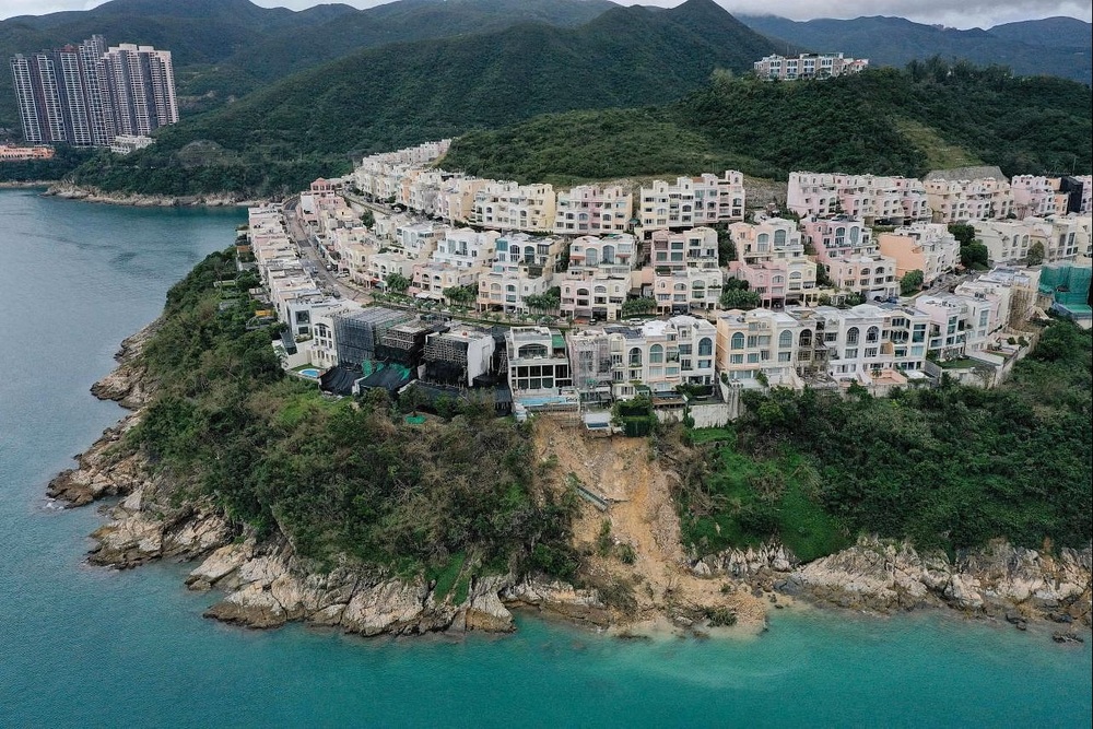 Some residents of Redhill Peninsula in Hong Kong’s Tai Tam district have been evacuated after record rains caused a landslide and brought to light the possibility of illegal structures. (AFP) Some residents of Redhill Peninsula in Hong Kong’s Tai Tam district have been evacuated after record rains caused a landslide and brought to light the possibility of illegal structures. (AFP)