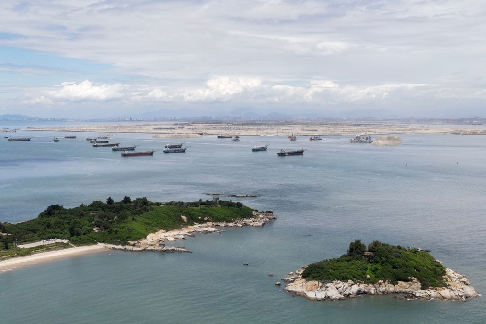Taiwan's Kinmen islands, foreground, across from China's Dadeng island in Xiamen. (AFP) Taiwan's Kinmen islands, foreground, across from China's Dadeng island in Xiamen. (AFP)