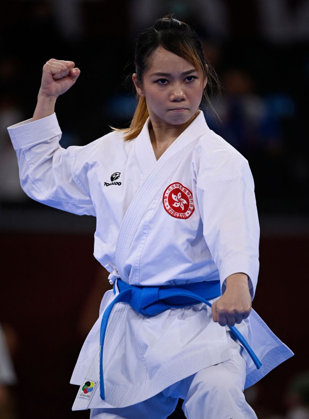 Crowds pack shopping malls, below, to cheer Grace Lau on to success.Reuters Crowds pack shopping malls, below, to cheer Grace Lau on to success.Reuters