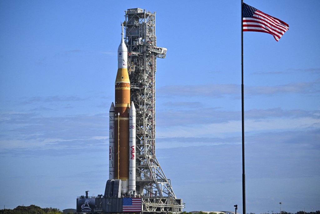 NASA's Artemis II Space Launch System rocket and Orion spacecraft are rolled out of the Vehicle Assembly Building to Launch Pad 39B at Kennedy Space Center in Florida on January 17, 2026. (AFP)