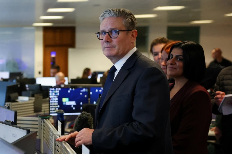Britain’s Prime Minister Keir Starmer and Home Secretary Shabana Mahmood visit the Greater Manchester Police headquarters in Manchester, England, Friday, Oct. 3, 2025, after multiple people were killed Thursday on Yom Kippur in what police have declared a terrorist incident. (Phil Noble/Pool Photo via AP)