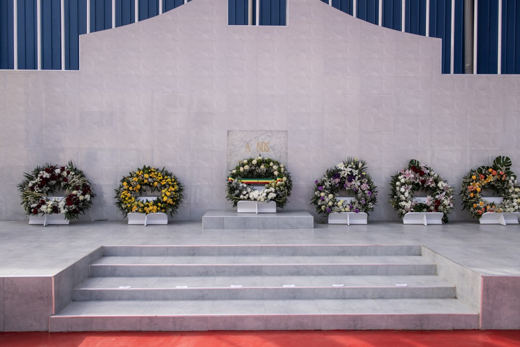 Photo by JOHN WESSELS / AFP. Wreaths of flowers laid at the Thiaroye Military Cemetery are pictured on December 1, 2024 after a ceremony marking the 80th anniversary of the Thiaroye Massacre.
