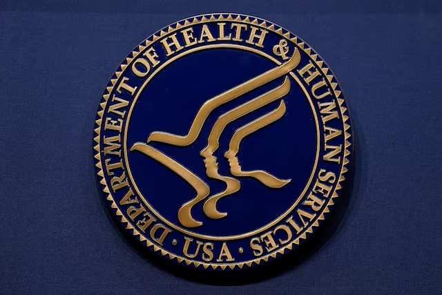 The seal of the U.S. Department of Health and Human Services (HHS) adorns a lectern during a press conference in Washington, D.C., U.S., April 16, 2025. REUTERS/Elizabeth Frantz