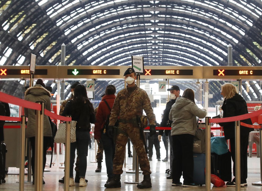 Police and soldiers check passengers leaving from Milan main train station, Italy, Monday, March 9. Police and soldiers check passengers leaving from Milan main train station, Italy, Monday, March 9.