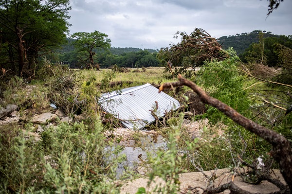The roof of a building is seen at an affected area after a deadly flooding in Kerr County, Texas, U.S., July 5, 2025. REUTERS/Sergio Flores