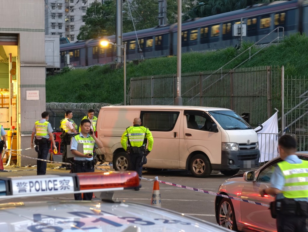 Police officers are on site investigating the cause of the accident.