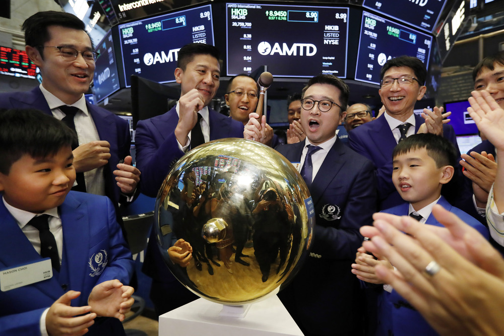 Calvin Choi, chairman and CEO of AMTD International, rings a ceremonial bell to celebrate his company's IPO at the New York Stock Exchange in 2019. Calvin Choi, chairman and CEO of AMTD International, rings a ceremonial bell to celebrate his company's IPO at the New York Stock Exchange in 2019.
