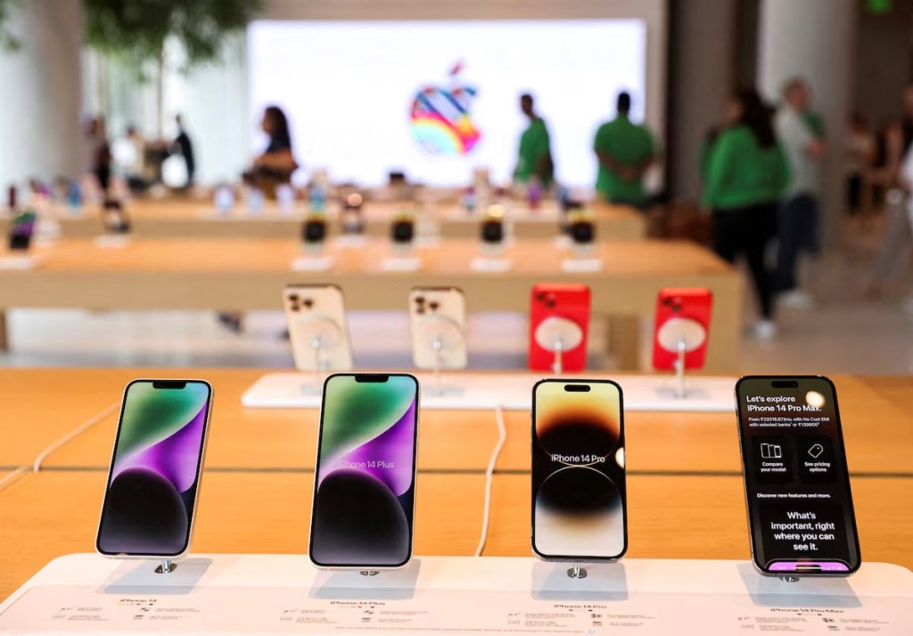 Apple iPhones are seen inside India's first Apple retail store during a media preview, a day ahead of its launch in Mumbai, India, April 17, 2023. REUTERS