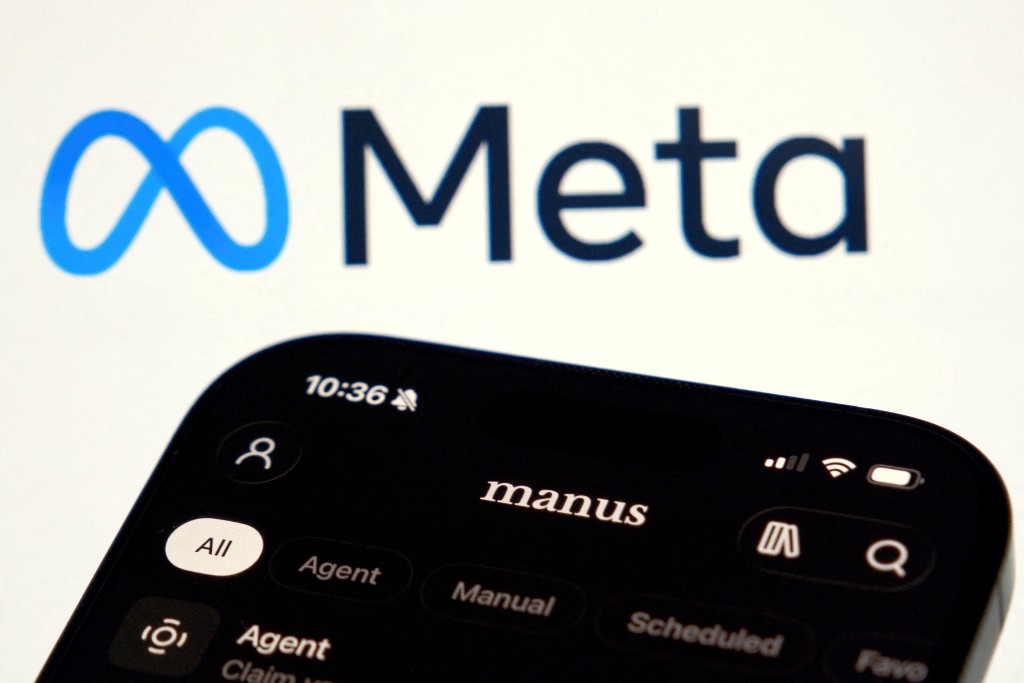 The Manus AI agent app is displayed on a mobile phone near the logo of U.S. tech giant Meta, in this illustration picture taken April 28, 2026. REUTERS