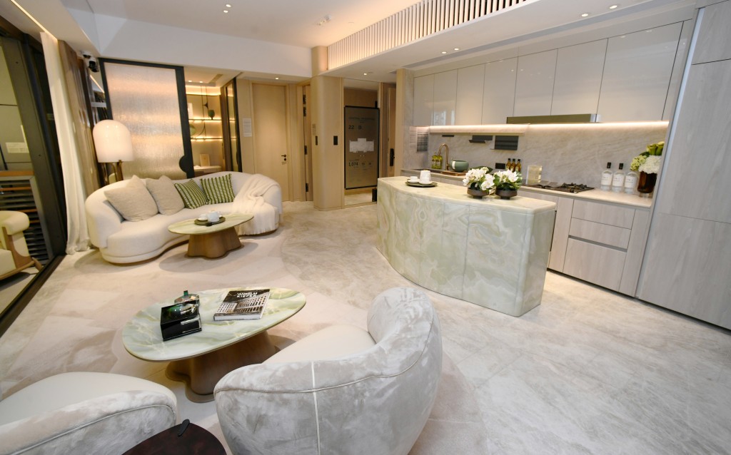 A showcase that mirrors Unit B on the 22nd floor. Photographer: Ho Kin Yung