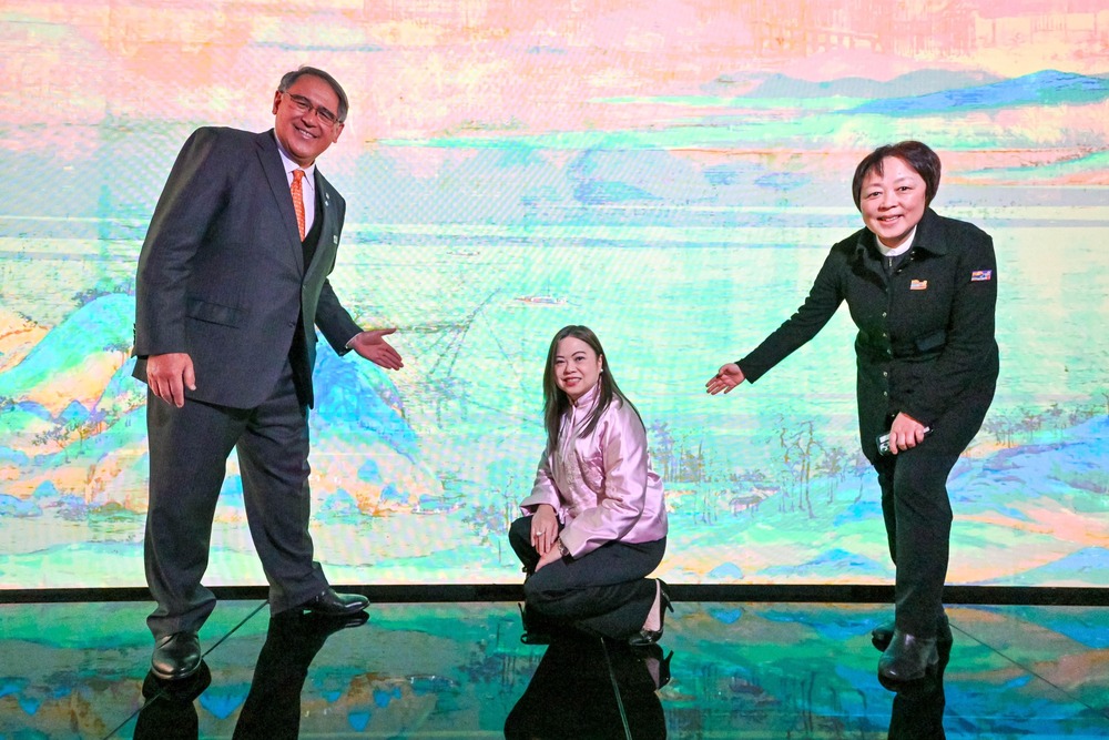 Guests tour at the ‘FLASH! The Palace Museum - A Pop-Up Digital Experience’ exhibition.