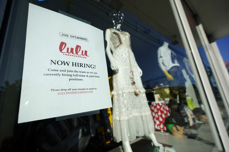 A store seeks recruits in the Wynwood Arts District of Miami, Florida. The number of Americans applying for unemployment benefits fell to a historically high 847,000 last week, a sign that layoffs remain high as the coronavirus pandemic continues to rage. A store seeks recruits in the Wynwood Arts District of Miami, Florida. The number of Americans applying for unemployment benefits fell to a historically high 847,000 last week, a sign that layoffs remain high as the coronavirus pandemic continues to rage.