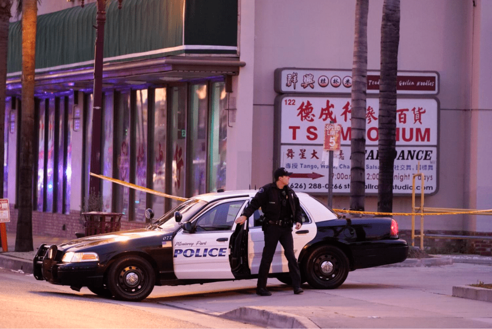 A police officer gets out of his vehicle near a ballroom dance club in Monterey Park, Calif., Sunday, Jan. 22, 2023. A mass shooting took place at a dance club following a Lunar New Year celebration, setting off a manhunt for the suspect. (AP Photo/Jae C. Hong) A police officer gets out of his vehicle near a ballroom dance club in Monterey Park, Calif., Sunday, Jan. 22, 2023. A mass shooting took place at a dance club following a Lunar New Year celebration, setting off a manhunt for the suspect. (AP Photo/Jae C. Hong)