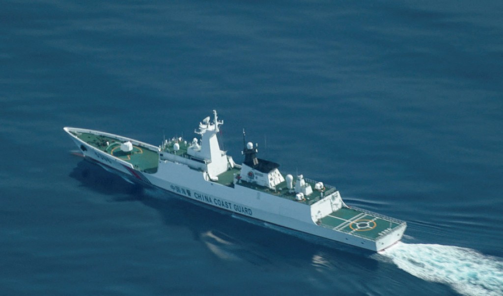 An aerial view of a China Coast Guard ship navigating near the disputed Scarborough Shoal in the South China Sea, August 13, 2025. (Reuters)