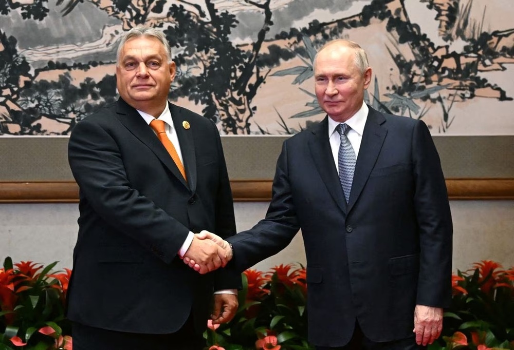 Russian President Vladimir Putin shakes hands with Hungarian Prime Minister Viktor Orban during a meeting ahead of the Belt and Road Forum in Beijing, China, October 17. (Reuters) Russian President Vladimir Putin shakes hands with Hungarian Prime Minister Viktor Orban during a meeting ahead of the Belt and Road Forum in Beijing, China, October 17. (Reuters)
