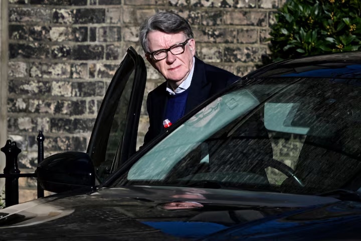 Former British Ambassador to the U.S. Peter Mandelson enters a vehicle outside a reported residence, after police launched a misconduct in public office investigation following the release of U.S. Justice Department files linked to the late financier and convicted sex offender Jeffrey Epstein, in London, Britain, February 14, 2026. REUTERS/Chris Ratcliffe
