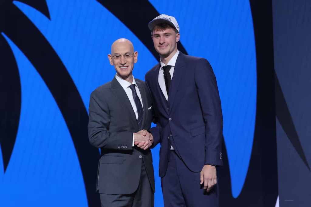 Jun 25, 2025; Brooklyn, NY, USA; Cooper Flagg poses with NBA commissioner Adam Silver after being selected as first overall by the Dallas Mavericks in the first round of the 2025 NBA Draft at Barclays Center. Mandatory Credit: Brad Penner-Imagn Images