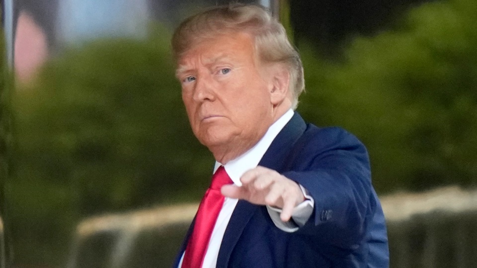 Former U.S. President Donald Trump arrives at Trump Tower, after his indictment by a Manhattan grand jury following a probe into hush money paid to porn star Stormy Daniels, in New York City, U.S April 3, 2023. (AP) Former U.S. President Donald Trump arrives at Trump Tower, after his indictment by a Manhattan grand jury following a probe into hush money paid to porn star Stormy Daniels, in New York City, U.S April 3, 2023. (AP)