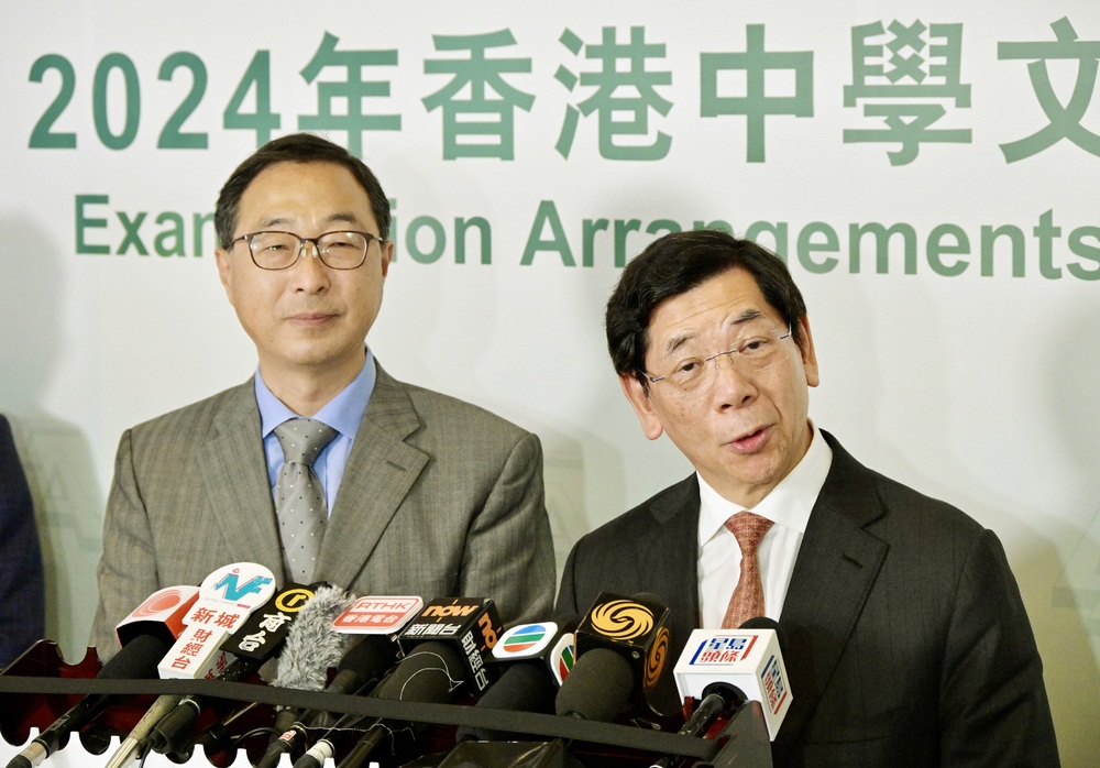 HKEAA Secretary General Wei Xiang-dong (left) and Chairman Samuel Yung Wing-ki (right). HKEAA Secretary General Wei Xiang-dong (left) and Chairman Samuel Yung Wing-ki (right).