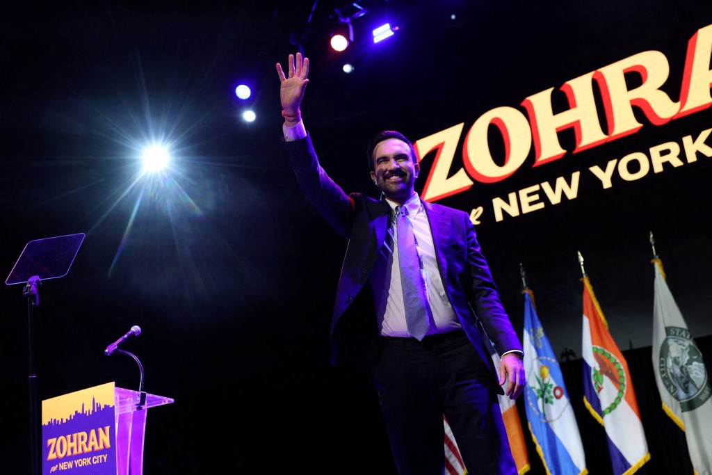 Democratic candidate for New York City mayor Zohran Mamdani waves on stage after winning the Mayoral race. Reuters