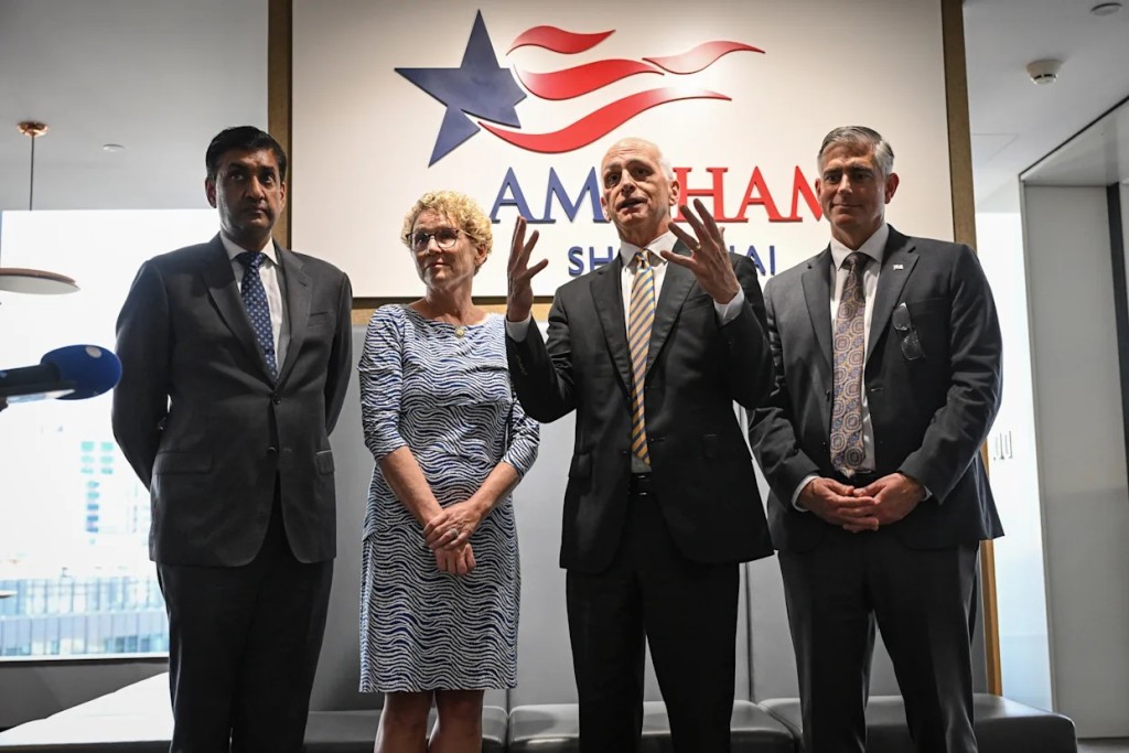 US Representative Adam Smith, second right, speaks as he stands next to Democratic member of House Armed Services Committee Ro Khanna, left, Democratic member of House Armed Services Committee Chrissy Houlahan, second left and Republican member of House Foreign Affairs Committee Michael Baumgartner, right during a press conference at the American Chamber of Commerce (AmCham) in Shanghai , China, Thursday, Sept.25, 2025. (Jade Gao/Pool Photo via AP)