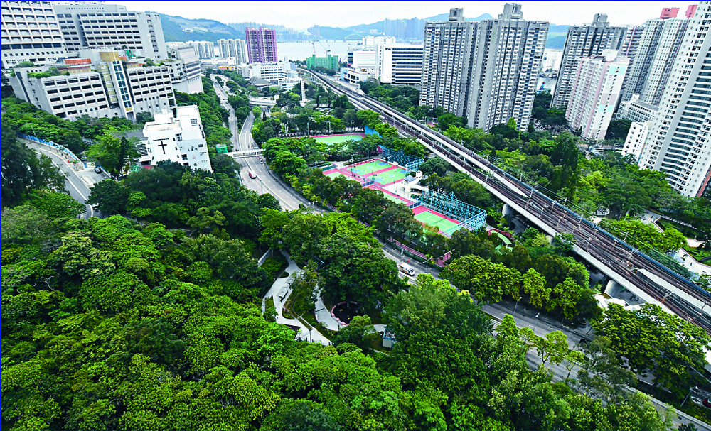 The sites will be in Chai Wan, left, and Tung Chung, says Winnie Ho, inset center, who is with Permanent Secretary for Housing Agnes Wong and Deputy Secretary for Housing Donald Ng. SING TAO The sites will be in Chai Wan, left, and Tung Chung, says Winnie Ho, inset center, who is with Permanent Secretary for Housing Agnes Wong and Deputy Secretary for Housing Donald Ng. SING TAO