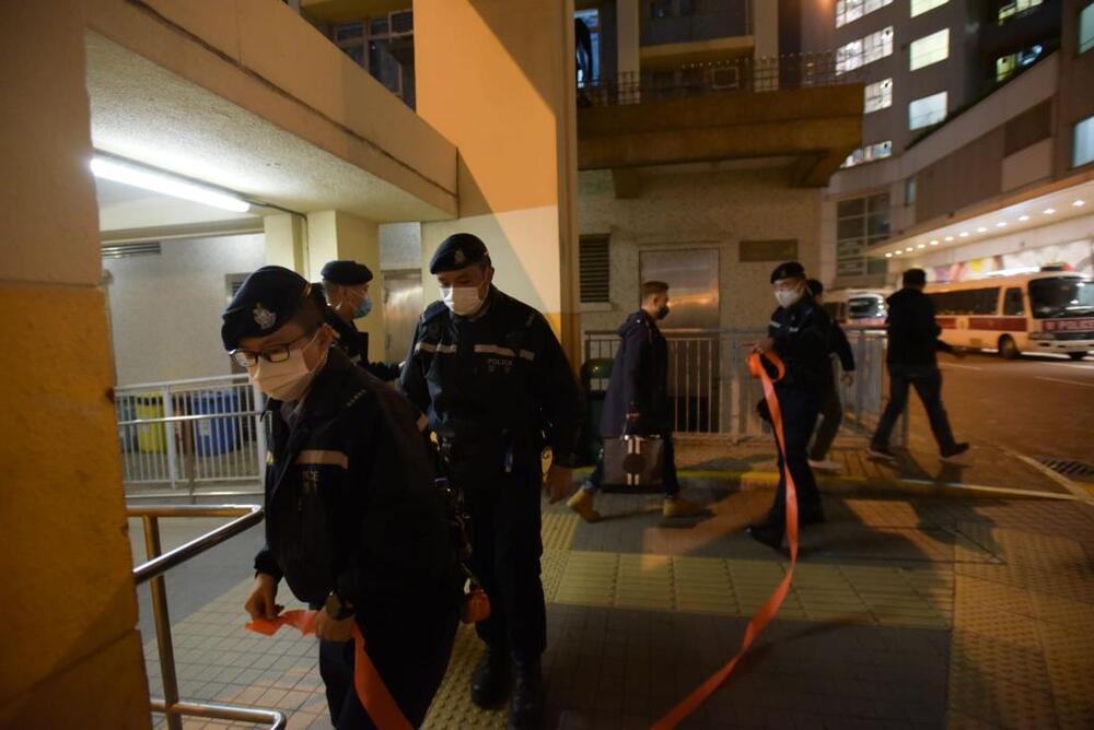 Police officers are mobilized to cordon off the area. 