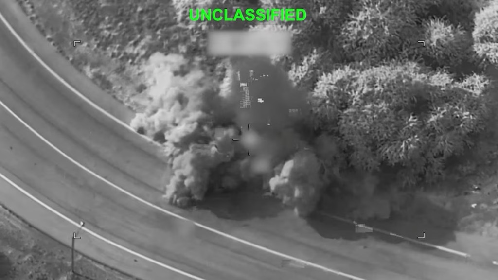 Smoke rises following a strike at an unknown location during what the U.S. military says is its latest wave of strikes on Iran, hitting "Iranian military targets such as coastal surveillance and air defense sites, military logistics infrastructure, and maritime capabilities," in this still image taken from handout video released July 16, 2026. U.S. Central Command/Handout via REUTERS