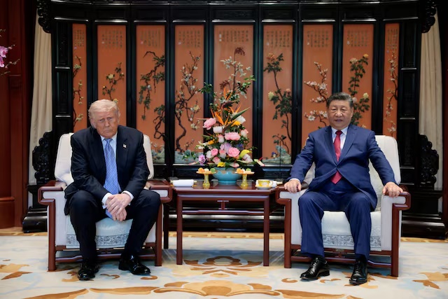Chinese President Xi Jinping and U.S. President Donald Trump attend a meeting on the sidelines of their visit to the Zhongnanhai Garden in Beijing, China, May 15, 2026. REUTERS/Evan Vucci/Pool/File Photo