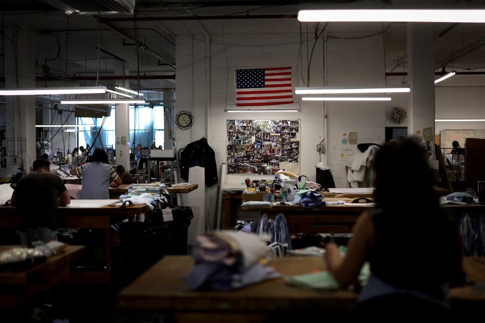 Employees work at the Gambert Shirts company, a maker of high quality custom dress shirts since 1933, at the company's manufacturing factory in Newark, New Jersey, U.S. March 5, 2025. REUTERS/Mike Segar Employees work at the Gambert Shirts company, a maker of high quality custom dress shirts since 1933, at the company's manufacturing factory in Newark, New Jersey, U.S. March 5, 2025. REUTERS/Mike Segar