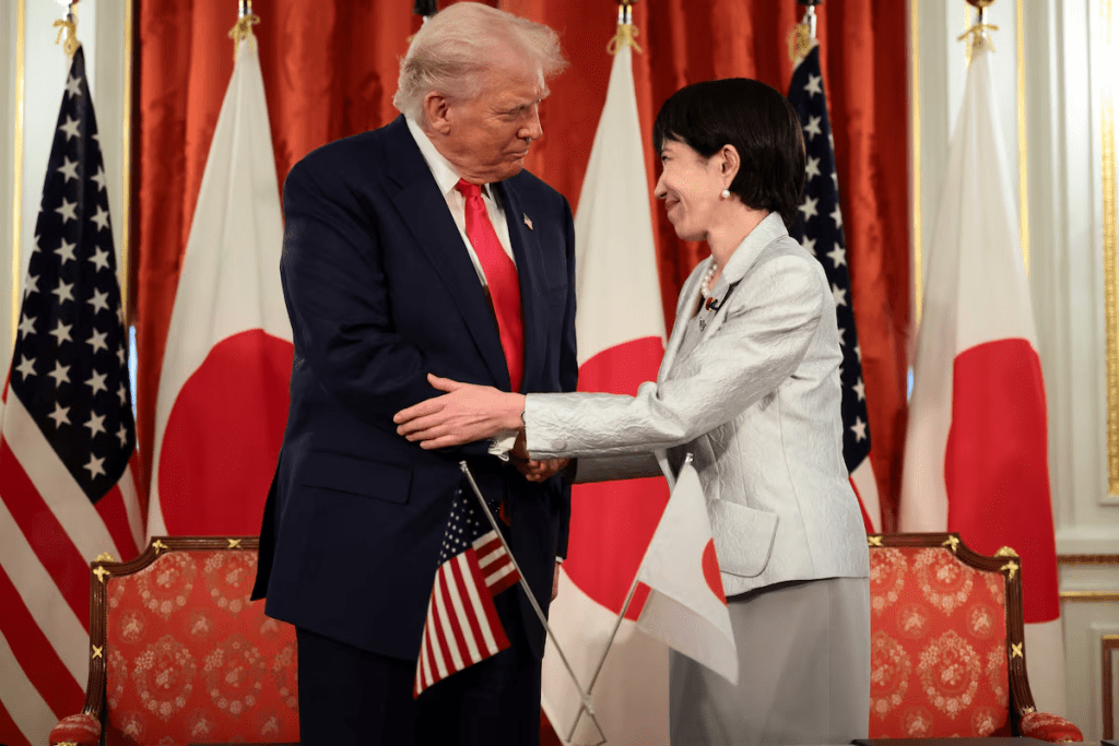U.S. President Donald Trump shakes hands with Japanese Prime Minister Sanae Takaichi during a bilateral meeting at Akasaka Palace in Tokyo, Japan, October 28, 2025. REUTERS/Evelyn Hockstein 
