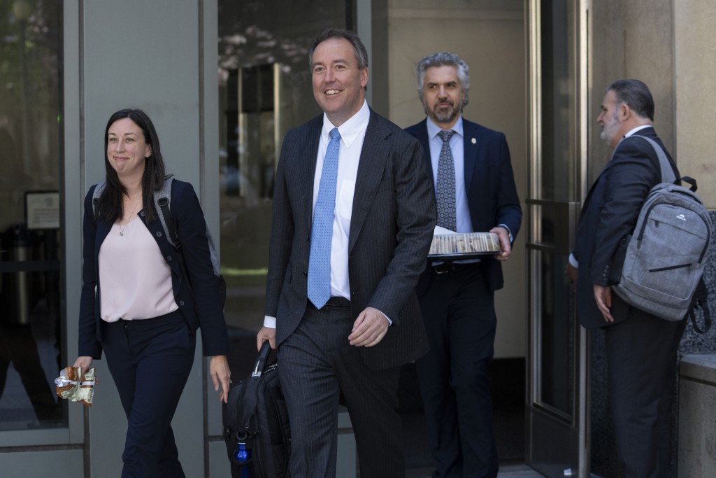 Photo by GODOFREDO A. VÁSQUEZ / AFP  Colorado Chief Trial Counsel Jason Slothouber (2L) and California Deputy Attorney General Megan O’Neill (L) exit Ronald V. Dellums Federal Building & United States Courthouse in Oakland, California, on August 12, 2026 during jury selection as Meta faces trial about alleged harms to children.