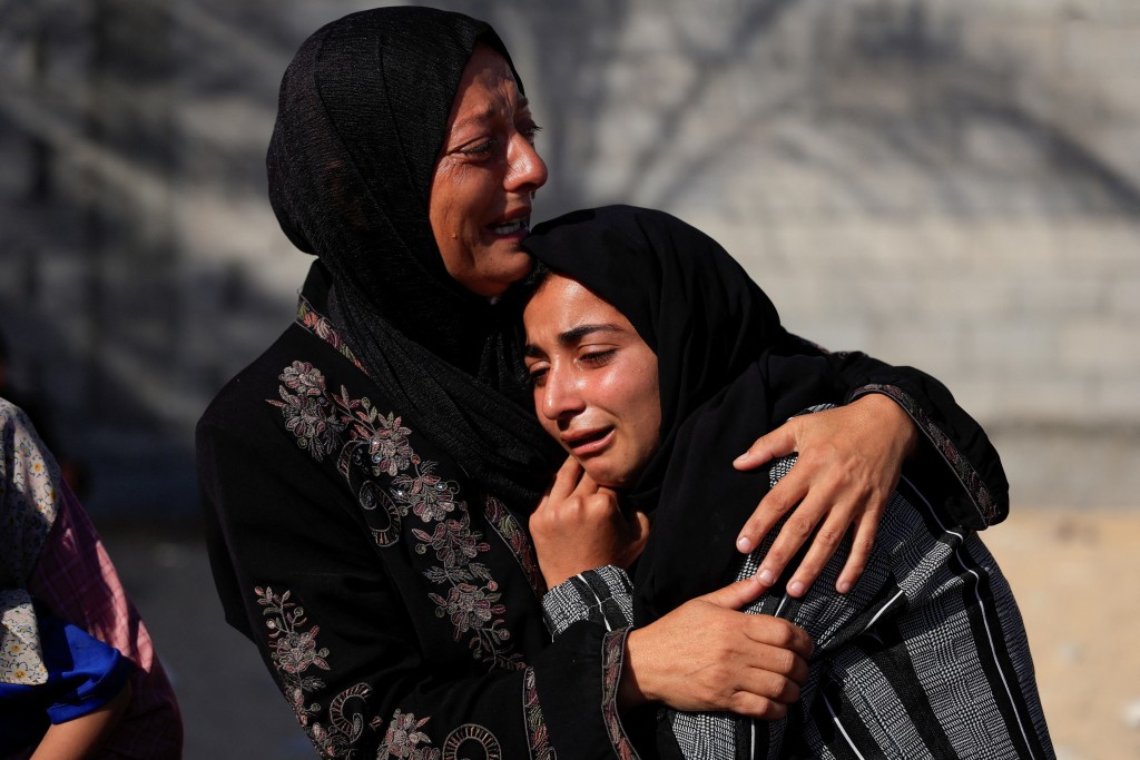 Mourners react during the funeral of Palestinians killed in an overnight Israeli strike on a tent, according to Gaza's health ministry, at Nasser Hospital in Khan Younis, southern Gaza Strip, June 29, 2025. (Reuters)