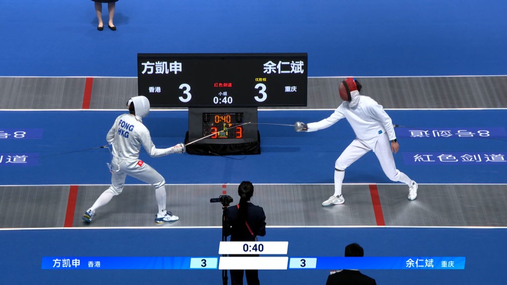 Hong Kong fencer Fong Hoi-sun in action during his pool bout against Chongqing's Yu Renbin.