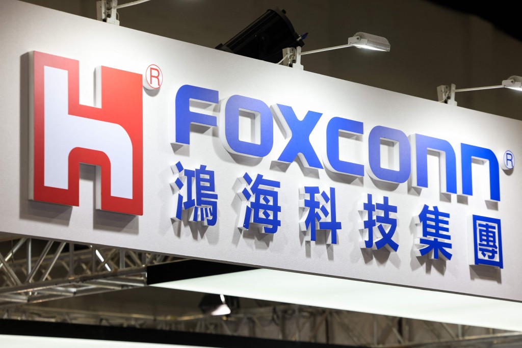 The logo of Foxconn is seen during the AutoTronics Taipei 2026 at Nangang Exhibition Center in Taipei on April 15, 2026. AFP