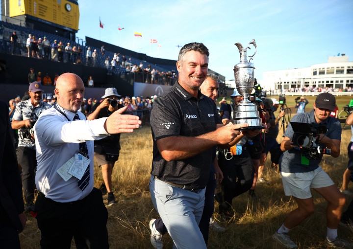 Ryan Fox celebrates with the Claret Jug after his one-shot victory at Royal Birkdale. REUTERS
