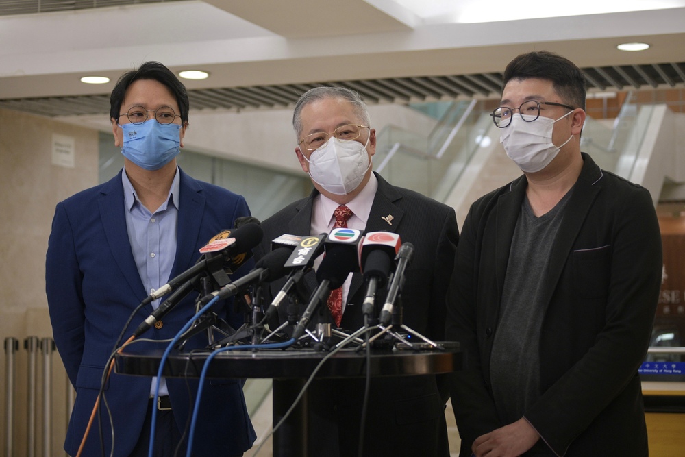 Bill Tang, far left, Tommy Cheung, center, and Edward Lau submitted a proposal on the structure of the council of the Chinese University of Hong Kong. Bill Tang, far left, Tommy Cheung, center, and Edward Lau submitted a proposal on the structure of the council of the Chinese University of Hong Kong.