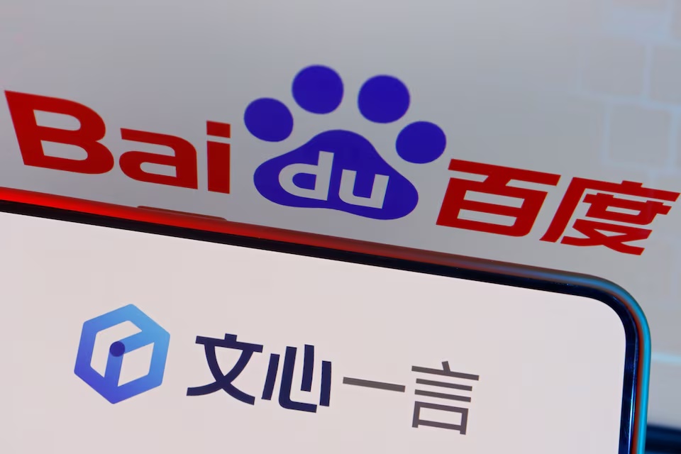 The logo of Baidu's AI chatbot Ernie Bot is displayed near a screen showing the Baidu logo, in this illustration picture taken June 28, 2023. REUTERS/Florence Lo/Illustration/File Photo The logo of Baidu's AI chatbot Ernie Bot is displayed near a screen showing the Baidu logo, in this illustration picture taken June 28, 2023. REUTERS/Florence Lo/Illustration/File Photo
